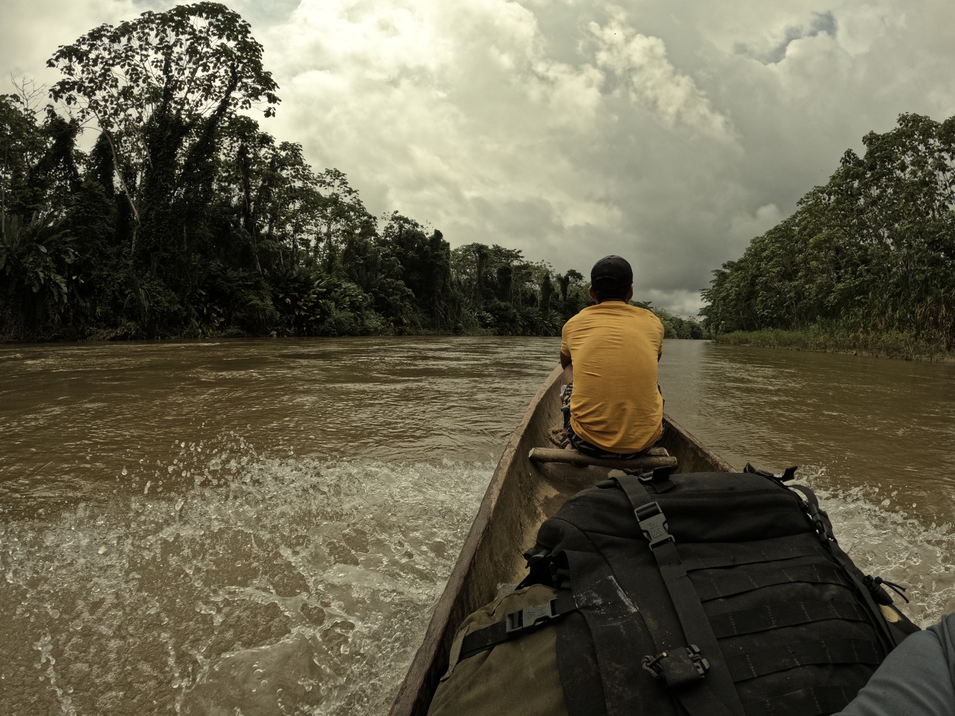 River insertion by dugout canoe on a remote tropical river